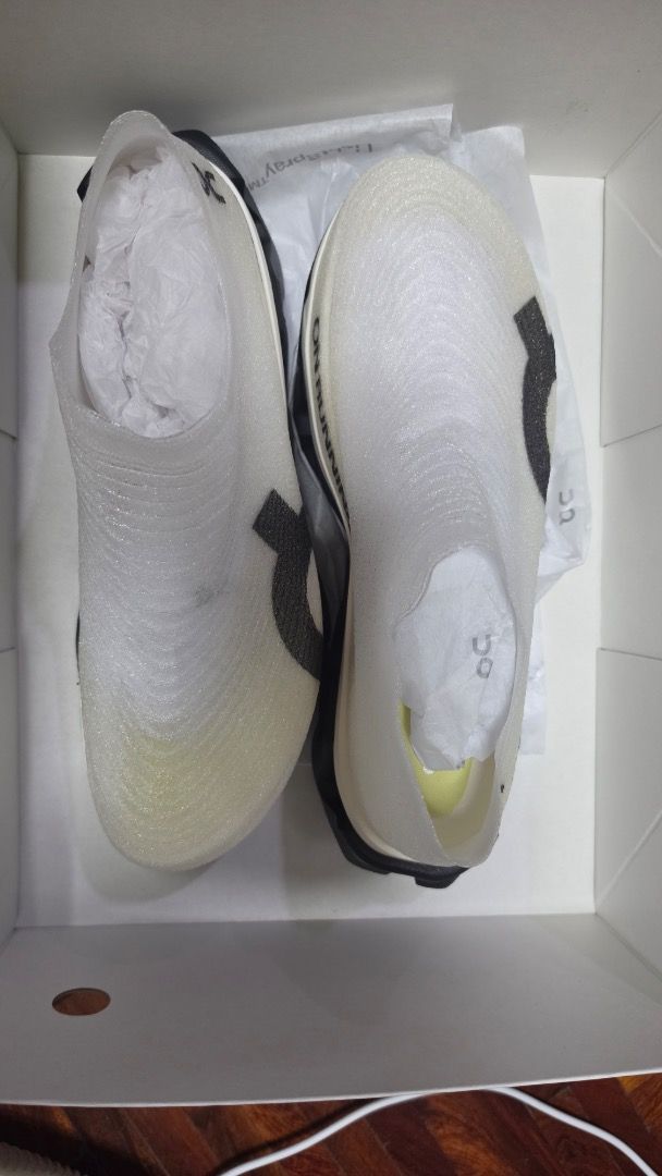 ON Running Lightspray (Category: Sneakers) located in Manila. Submitted by 3ple_hhh (Listing ID 1459533446, Image 2). Description: - ON Running Lightspray - Size: US Women's 11 / Men's 9.5 - Color: White and Black - Style: Slip-on running shoes - Ideal for your runs - Comes with original box and a pair of sock.