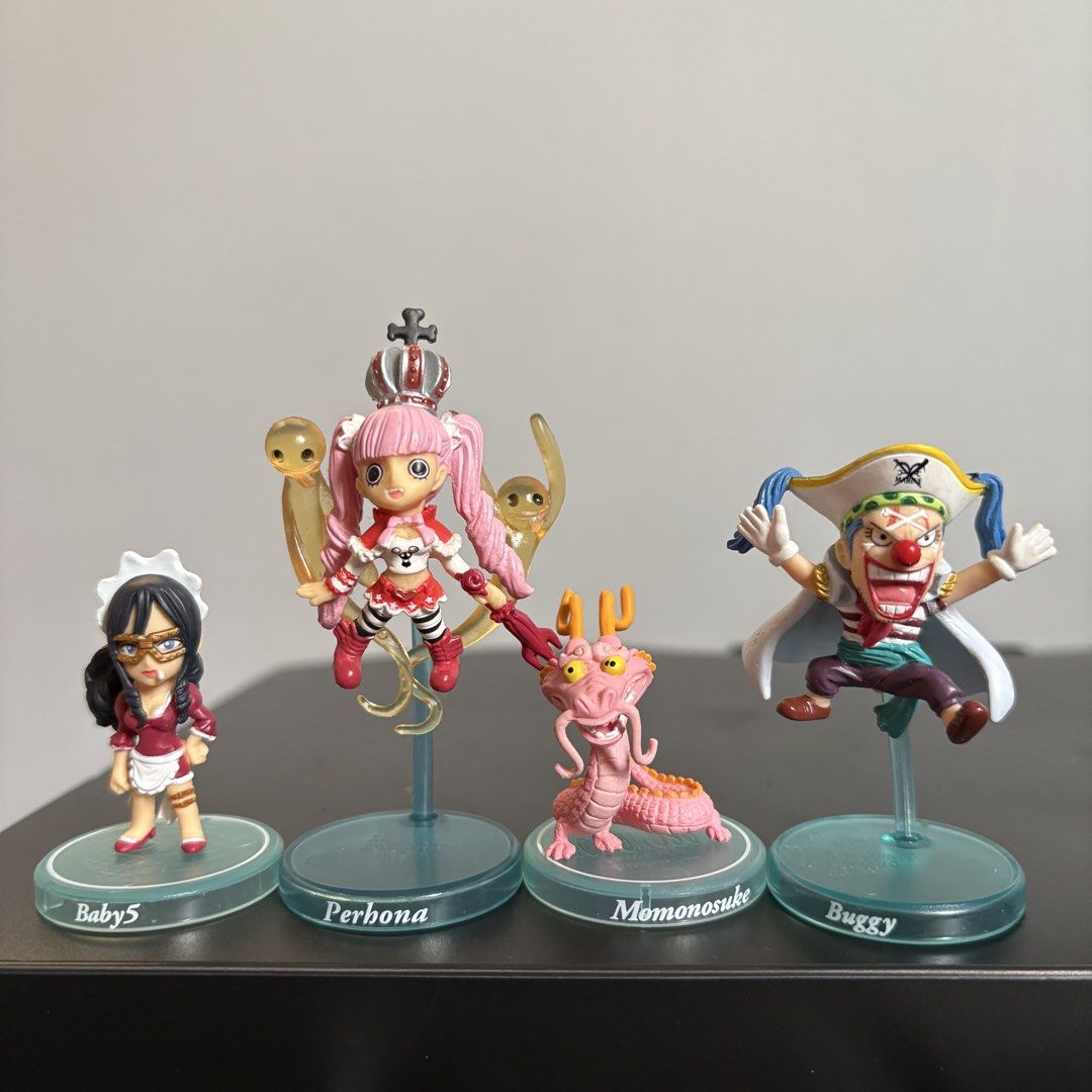 One Piece Chibi Figures - Baby5, Perona, Momonosuke, Buggy (Category: Designer & Blind Box Toys) located in Manila. Submitted by tj.merch (Listing ID 1459503583, Image 1). Description: - Includes: Baby5, Perona, Momonosuke (dragon form), and Buggy - Each figure has its own stand with a name label - Ideal for any One Piece fan's collection.
