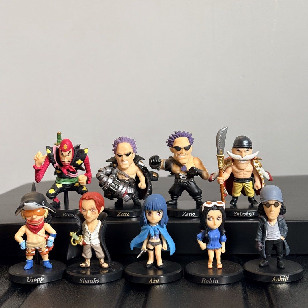 One Piece Chibi Figurines Set - 9 Pieces (Category: Designer & Blind Box Toys) located in Manila. Submitted by tj.merch (Listing ID 1459503085, Image 1). Description: - Set of 9 One Piece chibi figurines - Includes: Usopp, Shanks, Ain, Robin, Aokiji, Binz, Zetto (x2), Shirohige - Comes with their original bases - Great for any One Piece fan's collection - Display them together or separately.