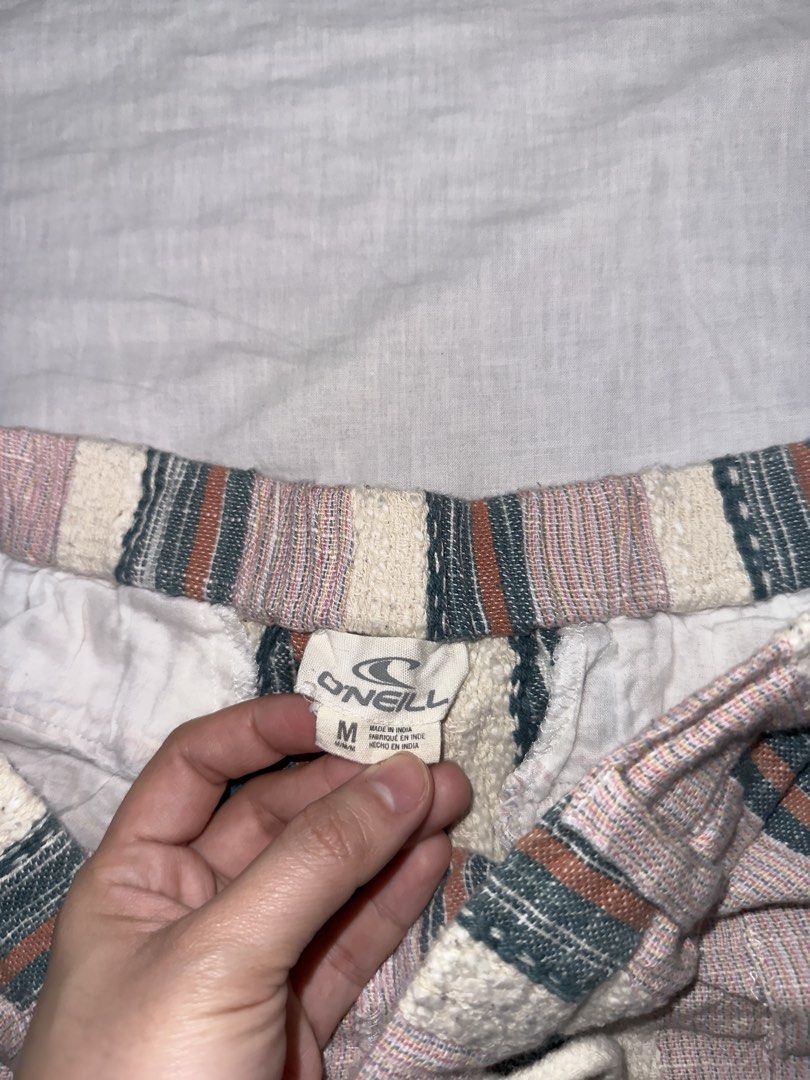 O'Neill Striped Drawstring Shorts Size M (Category: Shorts) located in Santa Ana. Submitted by fatikilla (Listing ID 1459565464, Image 2). Description: - Cute O'Neill shorts - Pink, white, grey, and brown stripes - Elastic waistband with drawstring - Two side pockets - Rolled hem - Made in India.