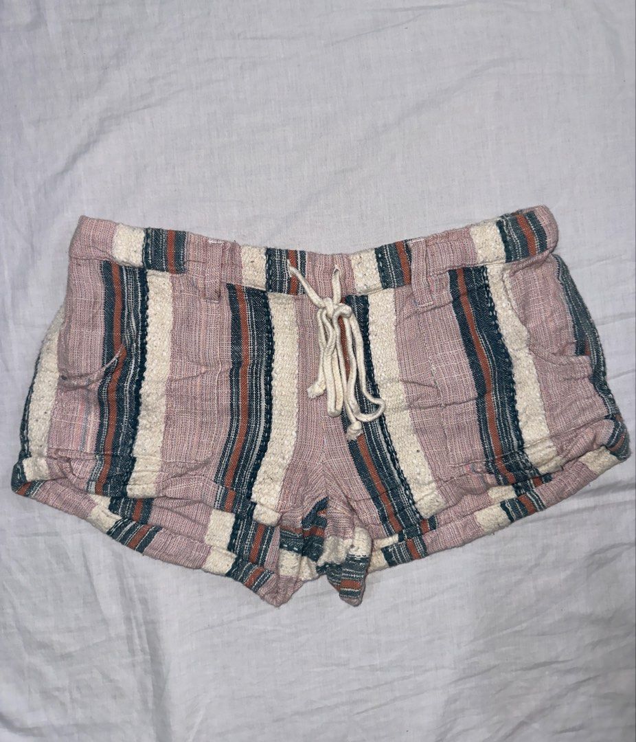 O'Neill Striped Drawstring Shorts Size M (Category: Shorts) located in Santa Ana. Submitted by fatikilla (Listing ID 1459565464, Image 1). Description: - Cute O'Neill shorts - Pink, white, grey, and brown stripes - Elastic waistband with drawstring - Two side pockets - Rolled hem - Made in India.