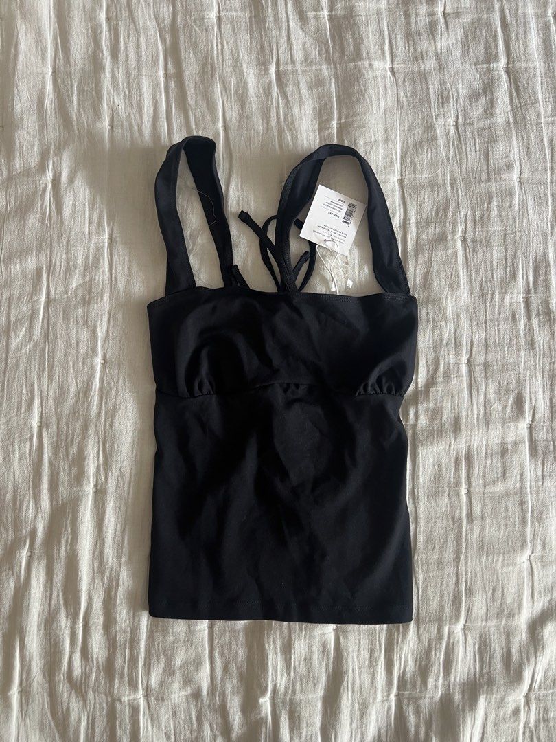 [ONHAND] Supre - Remi backless top black (Category: Sleeveless) located in Cebu City. Submitted by angel.energyph2 (Listing ID 1459629546, Image 1). Description: 🏷️ 750 Size XXS * Bust: 31.5 in (80 cm) * Waist: 24.4 in (62 cm) * Best fits: XXS/XS - Brand new with tag - Square neck - Fitted - Backless - Regular length - Straight hem - Responsibly sourced: Made from 20% recycled cotton from pre-consumer waste .