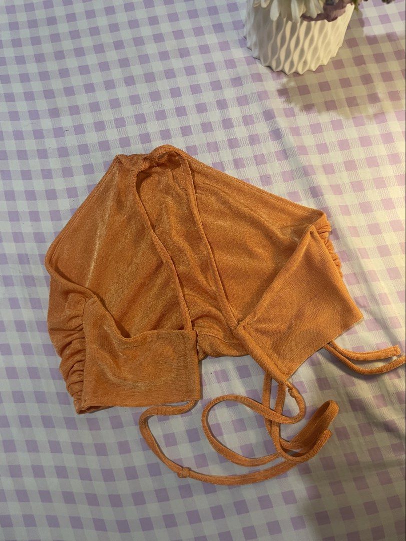 Orange Ruched Halter Neck Crop Top (Category: Sleeveless) located in Quezon City. Submitted by lovenzie (Listing ID 1459676420, Image 2). Description: ⋆˚꩜｡𐔌՞. .՞𐦯⋆. 𐙚 ˚ . . . 🛒🎐 - size small, never worn ! - stretchy fabric with subtle shimmer - great for beach days or night outs >< - pairs well with high-waisted jeans or skirts : P 🛍️🍡 ౨ৎ⋆ ˚｡ mop: gcash shipping: lalamove / grab ( shipping fee will be shouldered by the buyer ) 🍰 loc: qc !