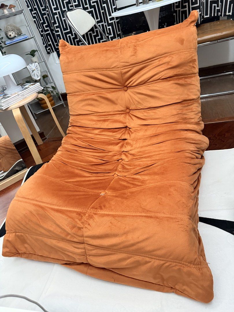 Orange Togo Inspired Chair (Category: Chairs) located in Quezon City. Submitted by acpacs (Listing ID 1459542444, Image 2). Description: Togo Inspired Chair Color: Orange Good condition no flaws For pickup at Cubao area .