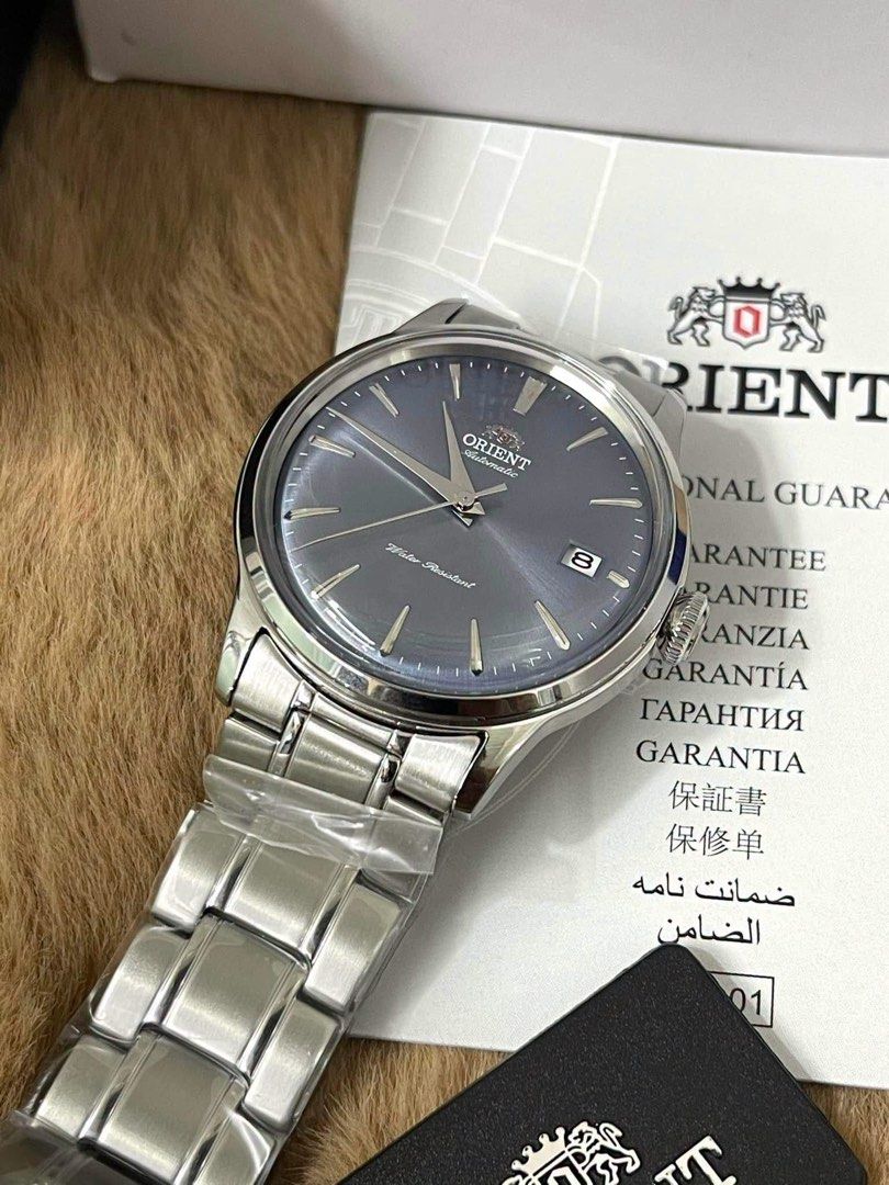 Orient 38mm Bambino RA-AC0M10L (Category: Women's Watches) located in Manila. Submitted by seikowatchfactory (Listing ID 1459549382, Image 2). Description: Model: RA-AC0M10L Price: 11995 Specifications: Stainless Steel Case Stainless Steel Bracelet Case Diameter: 38.4mm Case Thickness: 12.5mm Lug Width: 20mm Lug-to-lug: 44mm Crystal: Domed mineral glass Exhibition See-Through Case Back 30 meters Water Resistance Total Weight: 113g Caliber: Orient