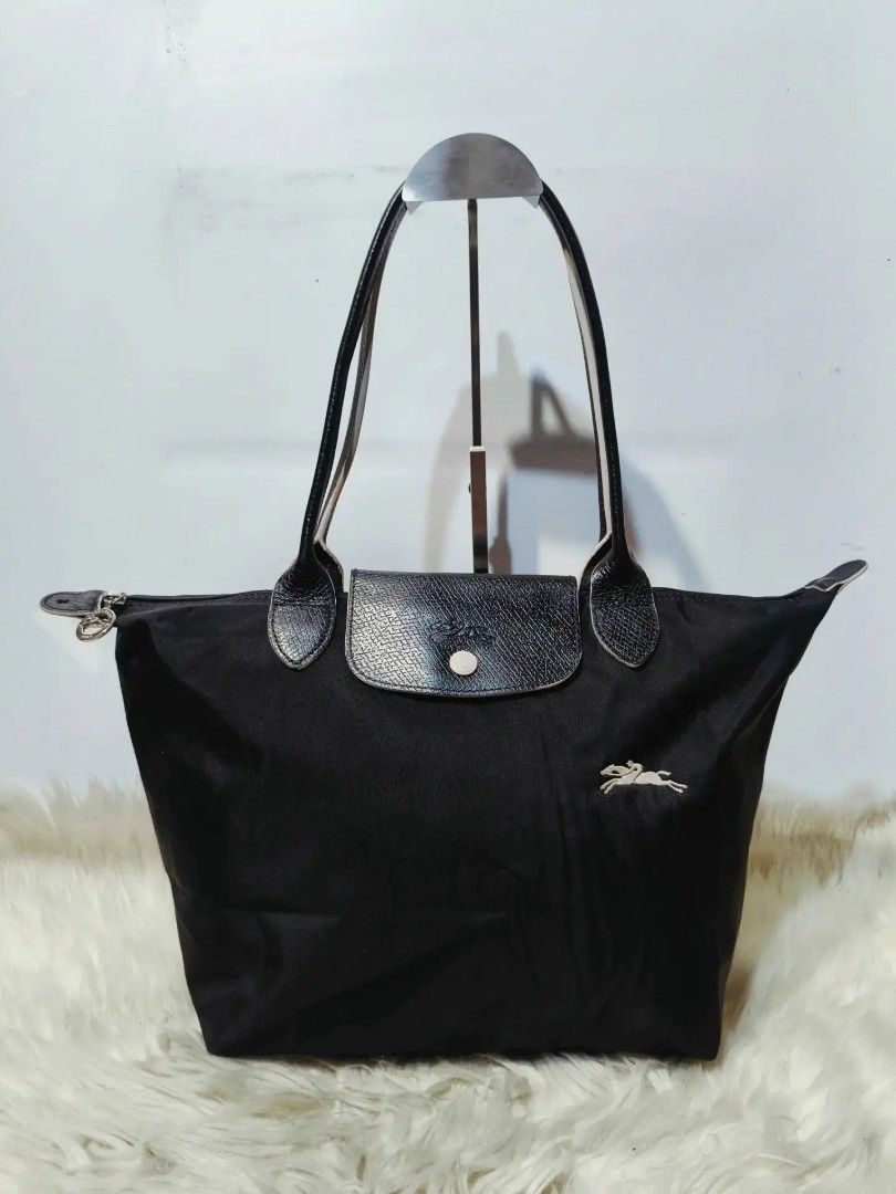 Original LONGCHAMP MLH (Category: Shoulder Bags) located in Caloocan City. Submitted by secondhand_shop2 (Listing ID 1459617903, Image 1). Description: Sale❗️Sale❗️Sale❗️ Original LONGCHAMP Preloved Black Medium Nylon & genuine leather trim 📌First to pay!.