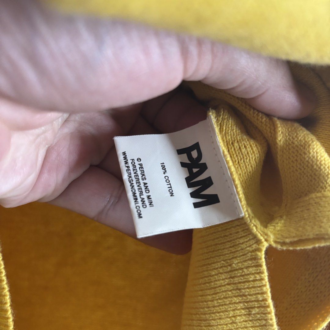 PAM -8””Yellow 100% Cotton Button-Up Cardigan (Category: Coats, Jackets and Outerwear) located in Cavite. Submitted by goodstayojan.cvt (Listing ID 1459603910, Image 2). Description: PAM Perks and Mini - Knitted Cardigan XS on tag(16 x 25-26 x 23sleeves) Good Condition Flaw: Dirt Stains, need wash, see detailsd pics - Yellow PAM cardigan - Made from 100% cotton - Features brown buttons down the front - Contrasting cream cuffs - Ideal for layering