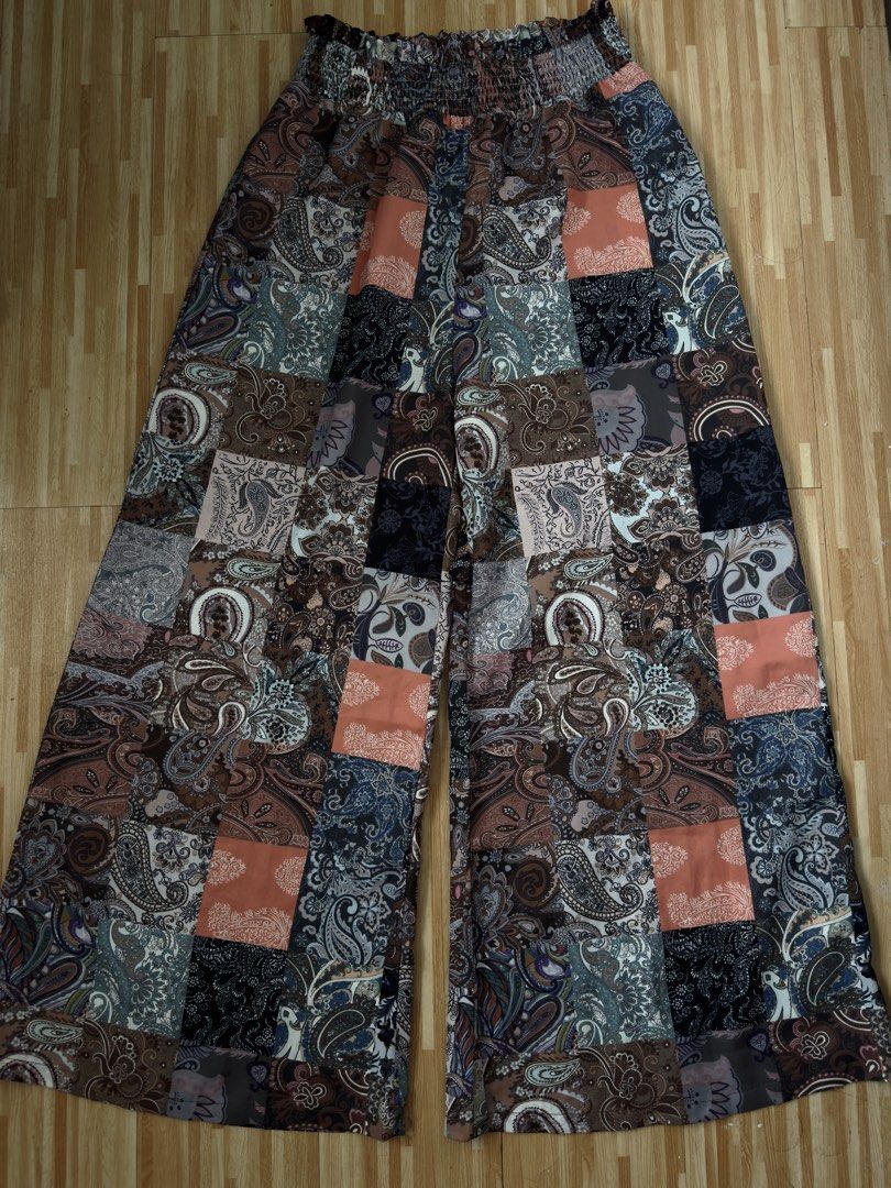 Patchwork Wide Leg Pants (Category: Other Bottoms) located in Manila. Submitted by ak.kini (Listing ID 1459547050, Image 1). Description: - Boho style wide leg pants - Flowy and perfect for everyday casual or bohemian looks -Size: L-XXL DM ME HERE OR ON INSTAGRAM FOR MORE INFORMATION: @ww.ak.ph .