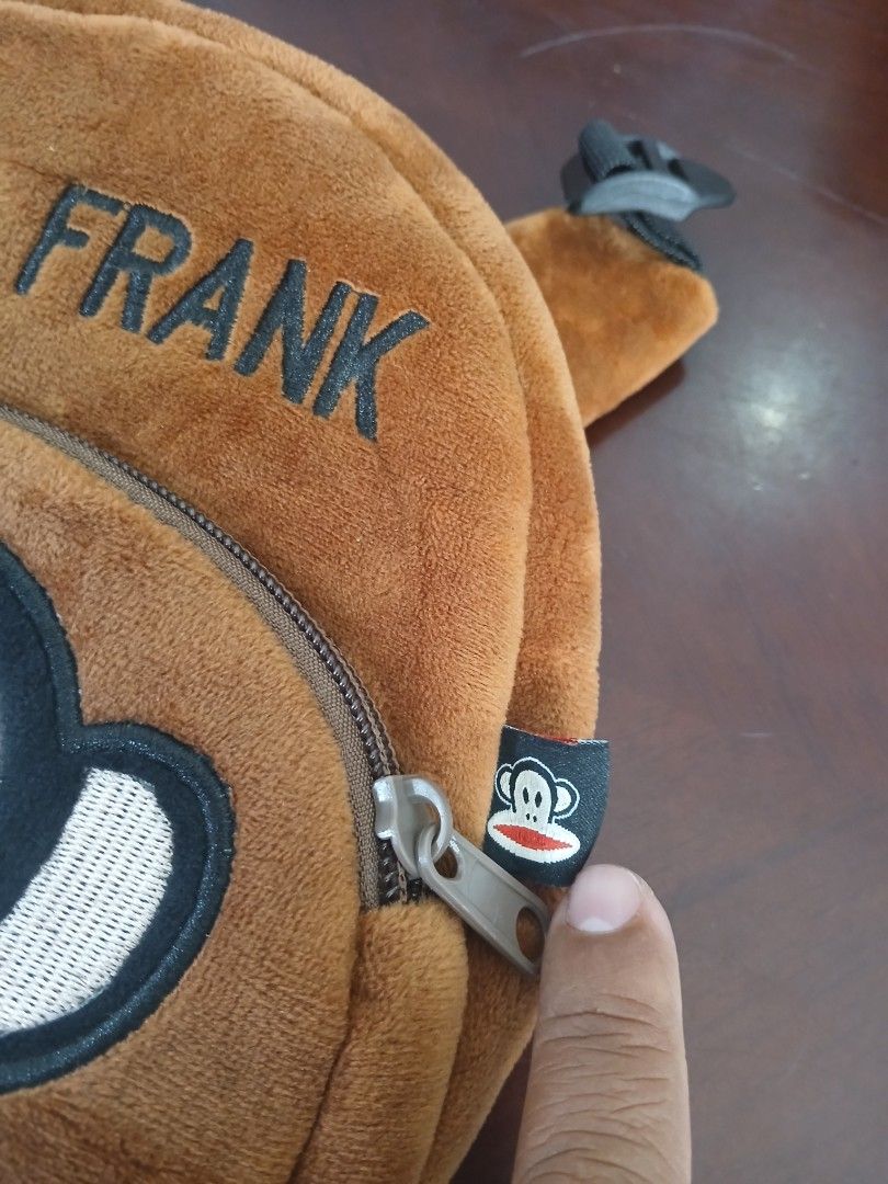 Paul Frank Julius Monkey Plush Backpack (Category: Backpacks) located in Taguig. Submitted by thriftnilhan (Listing ID 1459508688, Image 2). Description: - Adorable Paul Frank backpack featuring the iconic Julius monkey. - Made from soft, plush brown material. - Adjustable straps for a comfortable fit. - Main compartment with secure zipper closure. - Convenient small front pocket with zipper. - Perfect for kids or any Paul Frank enthusiast. - Gre