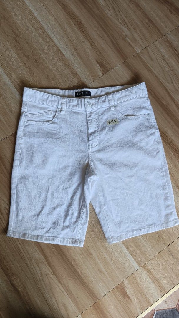 PEACEBIRD White Denim Shorts size 35-35 (Category: Shorts) located in Cavite. Submitted by thrifty.ever (Listing ID 1459526700, Image 1). Description: - Brand: PEACEBIRD - Color: White - Style: Classic five-pocket denim shorts - Closure: Button and zip fly - Size: 34-35 - Occasion: Ideal for casual wear - Like new condition.