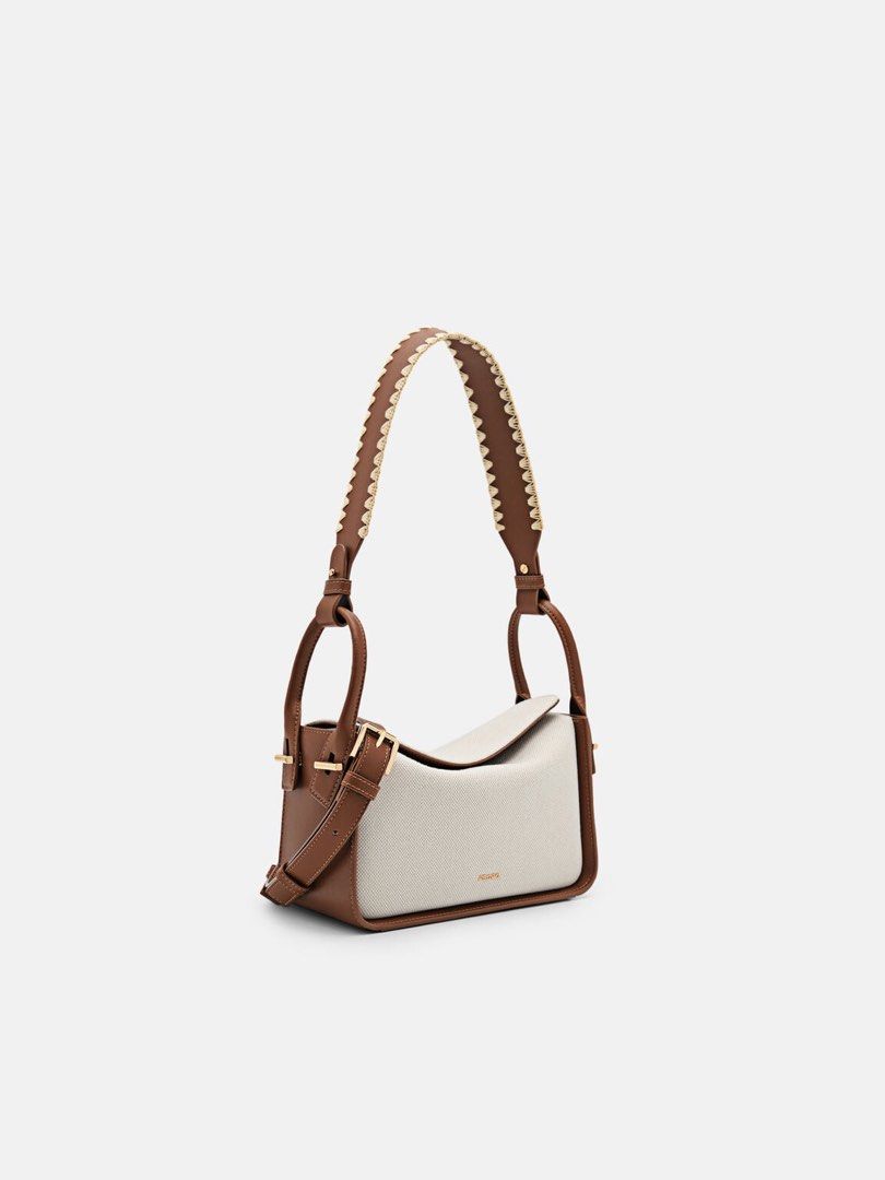 Pedro Demi Canvas Shoulder Bag (Category: Shoulder Bags) located in Pasig City. Submitted by ff.ph (Listing ID 1459647079, Image 1). Description: Pedro Demi Shoulder Bag Canvas 2tone (Brown) With Detachable and Adjustable long Strap Size 9 inches Magnetic closure With Echodustbag and tag Add paperbag plus 80 .