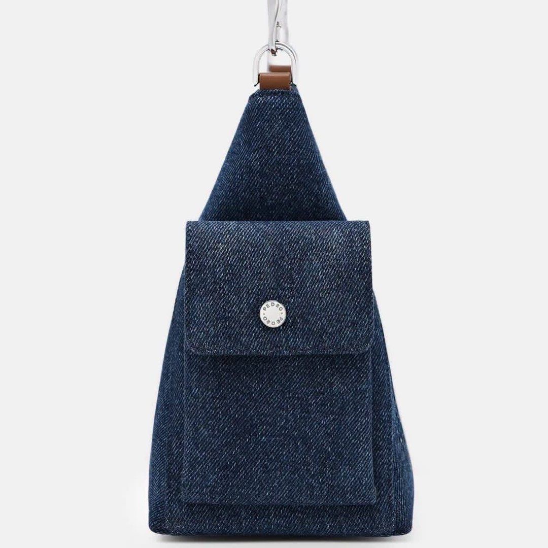 Pedro Kristen Denim Shoulder Bag (Category: Shoulder Bags) located in Pasig City. Submitted by ff.ph (Listing ID 1459645776, Image 3). Description: Denim Shoulder Bag with Leather Trim Size 12.5 inches Multi Pockets Zip closure Adjustable Shoulder Strap With Echodustbag and serial number With tag Add paperbag plus 80 .