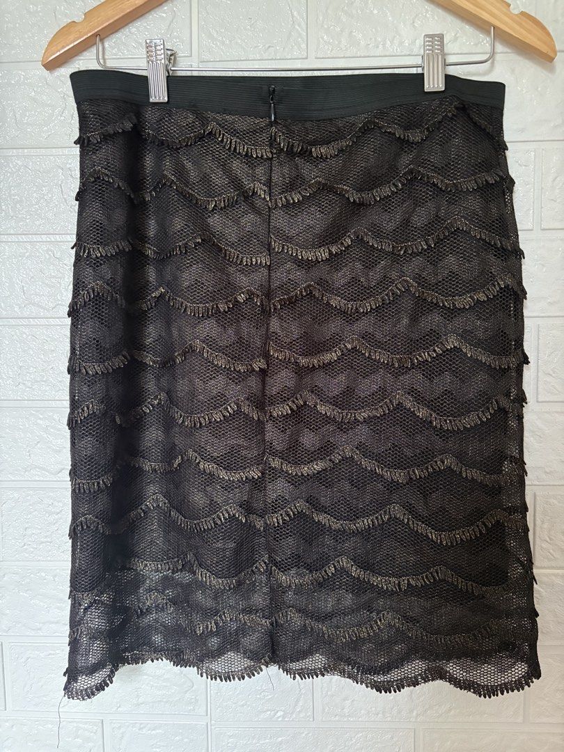 Pepco Black Lace Skirt Size M (Category: Skirts) located in Batangas. Submitted by purple_and_orange (Listing ID 1459530263, Image 3). Description: - Black lace skirt from Pepco - Tiered design with a scalloped hem - Comfortable elastic waistband - Perfect for dressing up or down - Ideal for parties or a night out.