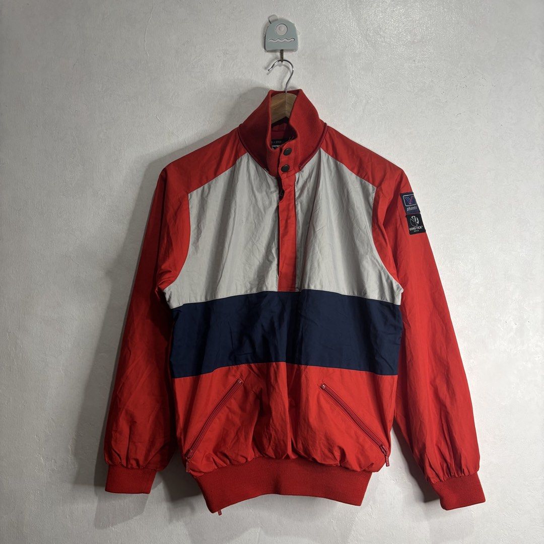 Phenix - Gore-Tex Ski Jacket Red Blue White (Category: Coats, Jackets and Outerwear) located in Cavite. Submitted by goodstayojan.cvt (Listing ID 1459599809, Image 1). Description: Vintage Phenix - Halfzip Nylon Jacket 3 on tag(20 x 23) Verygood Condition Flaw: stains, Need wash, Missing detachable hood - Vintage Phenix jacket - Features Gore-Tex fabric for waterproofing and breathability - Stylish colorblock design: red, white, and navy blue - S