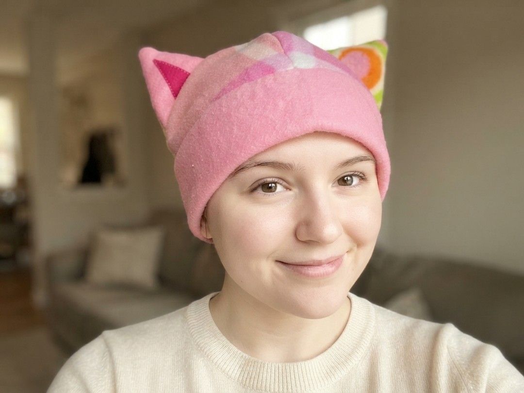 Pink Fleece Cat Ear Beanie (Category: Hats & Beanies) located in Binangonan. Submitted by yuristalin888 (Listing ID 1459577925, Image 1). Description: Add a playful touch to your wardrobe with this pink fleece cat-ear beanie. Crafted from a soft, fuzzy fabric, it features whimsical upright cat ears, a solid pink brim, and a colorful patterned crown blending shades of pink, white, orange, and green. Cozy, fun, and unique, it's the purrfect accesso