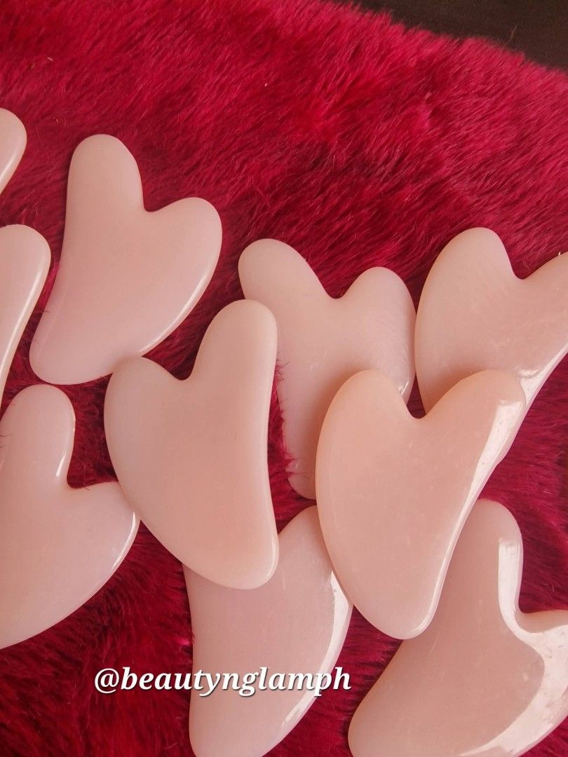 Pink Heart Gua Sha (Category: Face Care) located in Quezon City. Submitted by floreskari78555 (Listing ID 1459550977, Image 3). Description: ​🌸 Pink Heart Gua Sha 🌸 Your new secret to a depuffed, glowing face! Our high-grade pink resin gua sha is smooth, lightweight, and 100% shatter-resistant. 💅✨ ​How to get that glow: 1️⃣ Apply your favorite facial oil or serum. 2️⃣ Hold the tool flat against your skin. 3️⃣ Gently glide in upward and outward