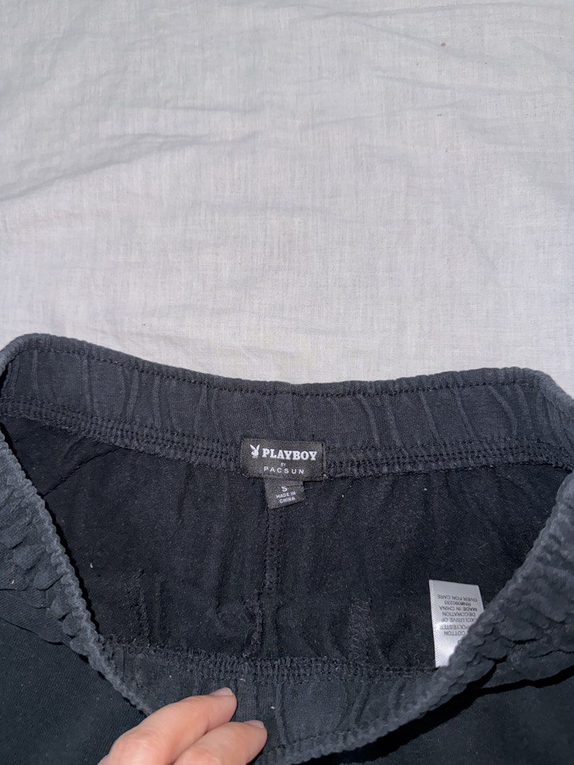Playboy Pacsun Black Shorts Size S (Category: Shorts) located in Santa Ana. Submitted by fatikilla (Listing ID 1459566670, Image 2). Description: - Black Playboy shorts from Pacsun - Comfortable elastic waistband - Iconic Playboy bunny logo on left leg - Ideal for lounging or casual wear - Size: S.