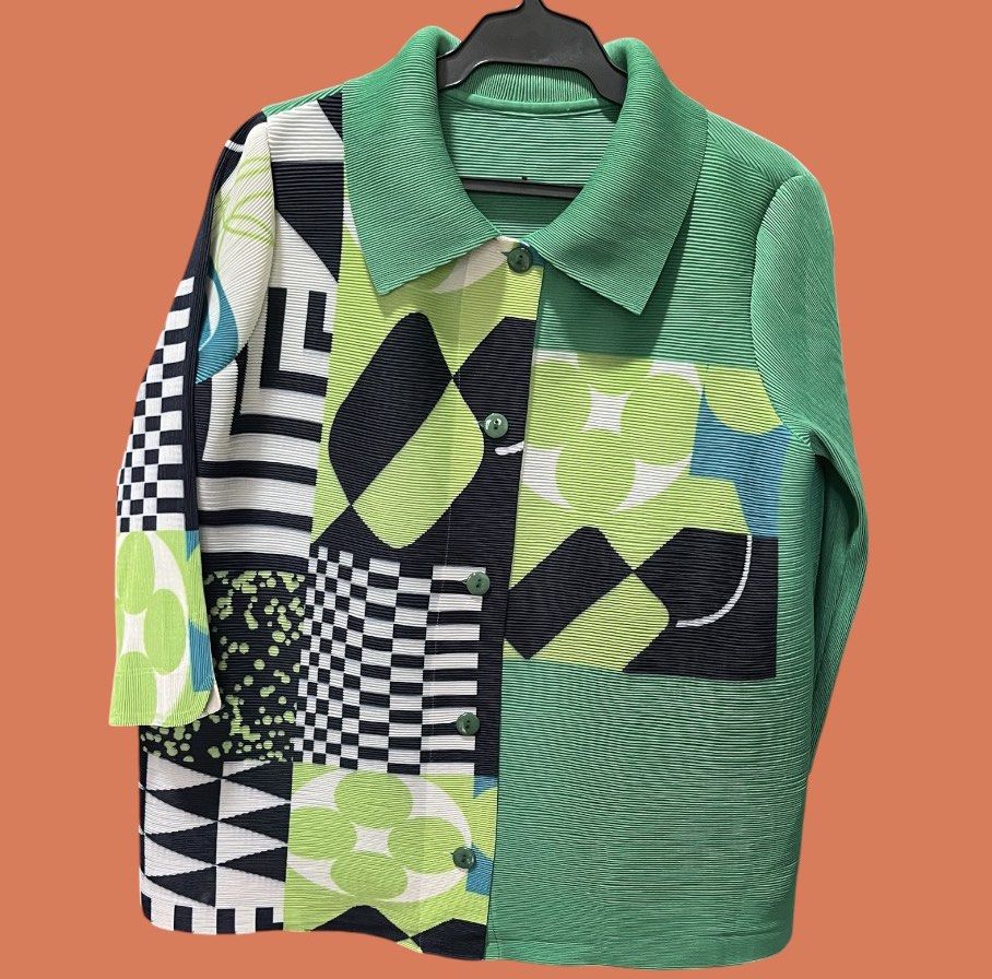 Pleats Please Alternative Printed Blouse (Category: Blouses) located in Calapan. Submitted by axlefinestpicks (Listing ID 1459669039, Image 3). Description: Same with Pleats Please fabric feel Eye catching color/print Fits medium to large. Polyester fabric. Brand new but no tags anymore..