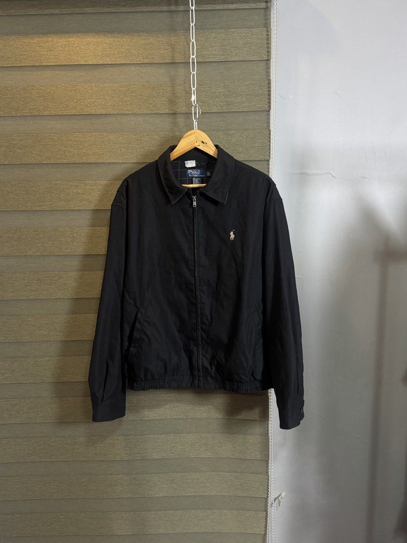 Polo Ralph Lauren Black Jacket Size L (Category: Coats, Jackets and Outerwear) located in Santa Ana. Submitted by thrift.sanctuary (Listing ID 1459626244, Image 1). Description: 26,25 L on tag - Classic black jacket from Polo Ralph Lauren - Iconic polo player logo embroidered on chest - 100% polyester shell and lining - Full zip closure - Perfect for layering - Size: Large (L).