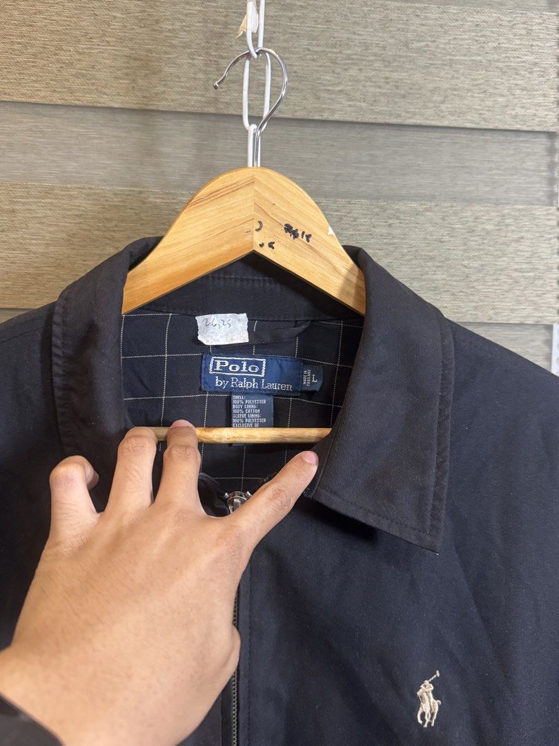 Polo Ralph Lauren Black Jacket Size L (Category: Coats, Jackets and Outerwear) located in Santa Ana. Submitted by thrift.sanctuary (Listing ID 1459626244, Image 3). Description: 26,25 L on tag - Classic black jacket from Polo Ralph Lauren - Iconic polo player logo embroidered on chest - 100% polyester shell and lining - Full zip closure - Perfect for layering - Size: Large (L).