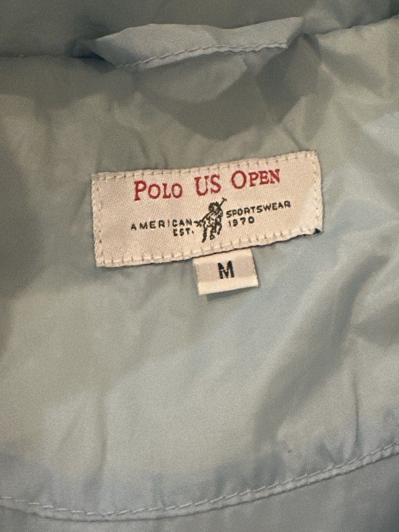 Polo US Open Puffer Vest Size M (Category: Vests) located in Rizal. Submitted by rann1121 (Listing ID 1459588398, Image 3). Description: - Light blue puffer vest - Brand: Polo US Open - Size: Medium (M) - Embroidered Polo US Open logo on chest - Two side pockets - Perfect for layering - Great for golf or casual outfits.