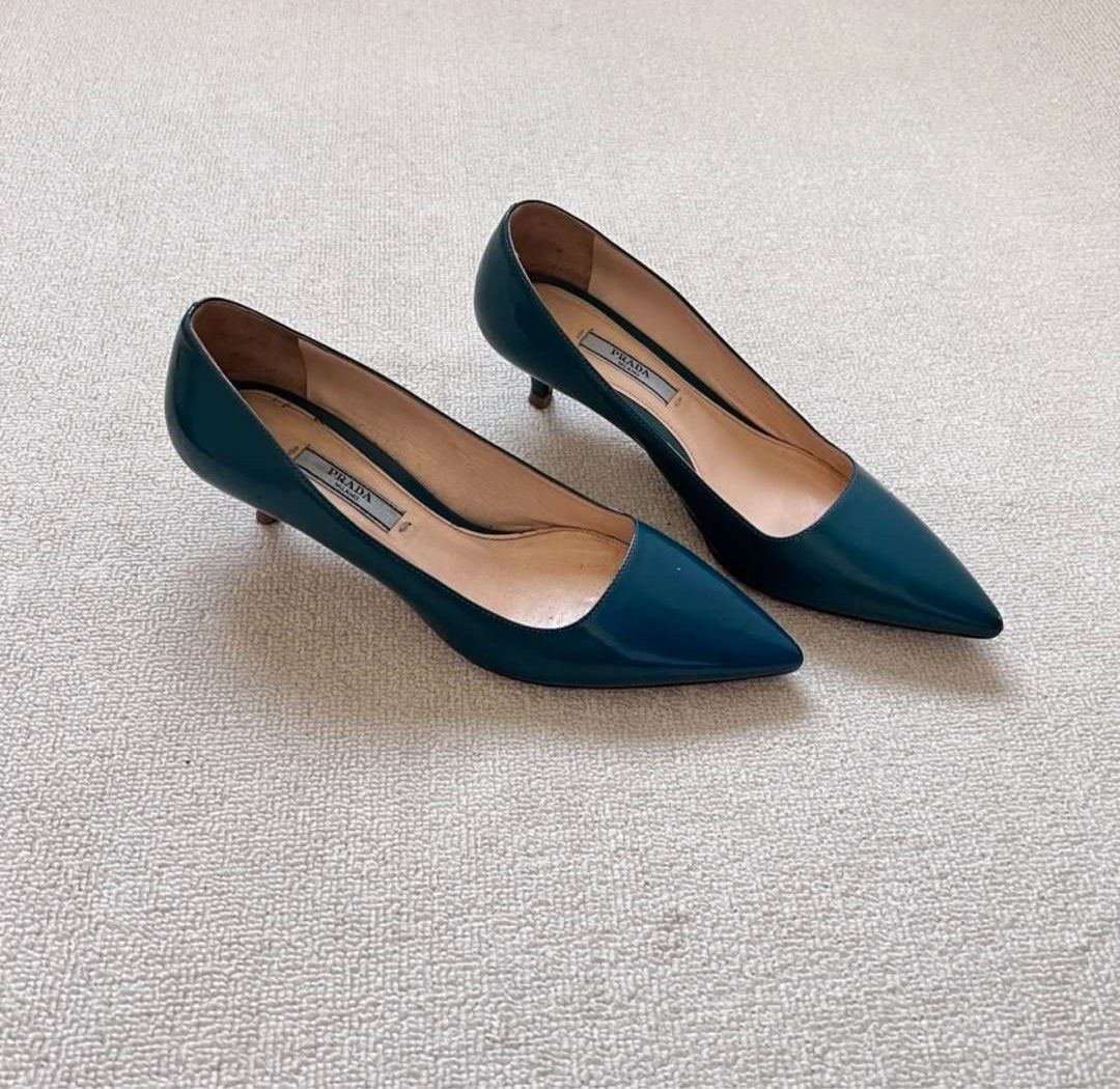 Prada Teal Patent Leather Kitten Heels Size 36 (Category: Sneakers & Footwear) located in Quezon City. Submitted by skinnyshopaholic (Listing ID 1459510775, Image 1). Description: - Brand: Prada - Material: Teal patent leather - Style: Kitten heels - Toe: Pointed - Heel Height: Approx. 2 inches - Origin: Made in Italy - Size: 36 - Condition: Some wear on heel tips and soles..