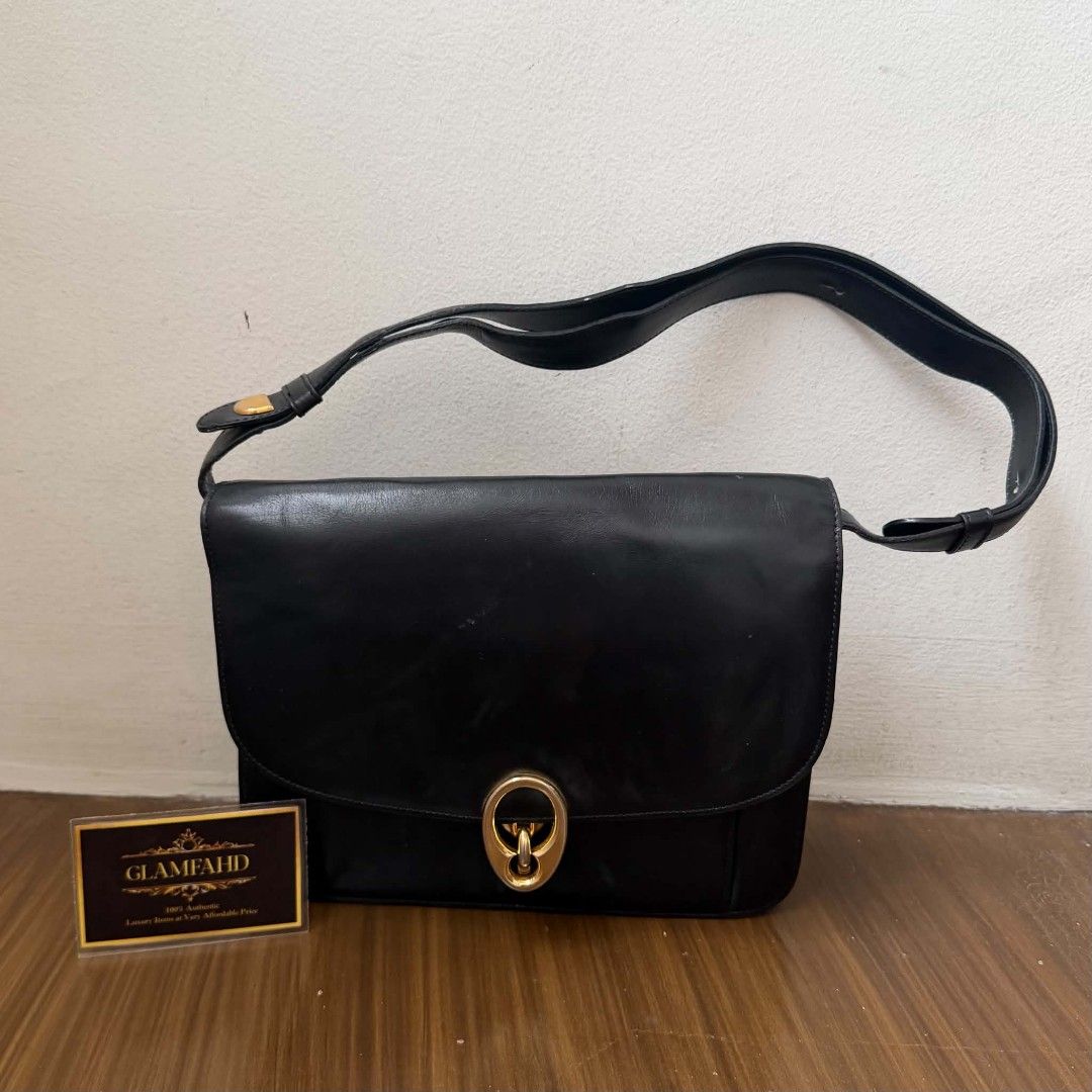 Pre Owned Authentic Vintage CELINE PARIS Leather Shoulder Bag (Category: Luxury Bags & Wallets) located in Paranaque City. Submitted by Glamfahd (Listing ID 1459515916, Image 1). Description: Pre Owned Authentic CELINE Bag Inclusion/s: None Condition Well Used condition Marks on exterior Marks on interior Bag is really a great buy! Please manage your expectations as you are buying an authentic second hand item at a fraction of the cost.