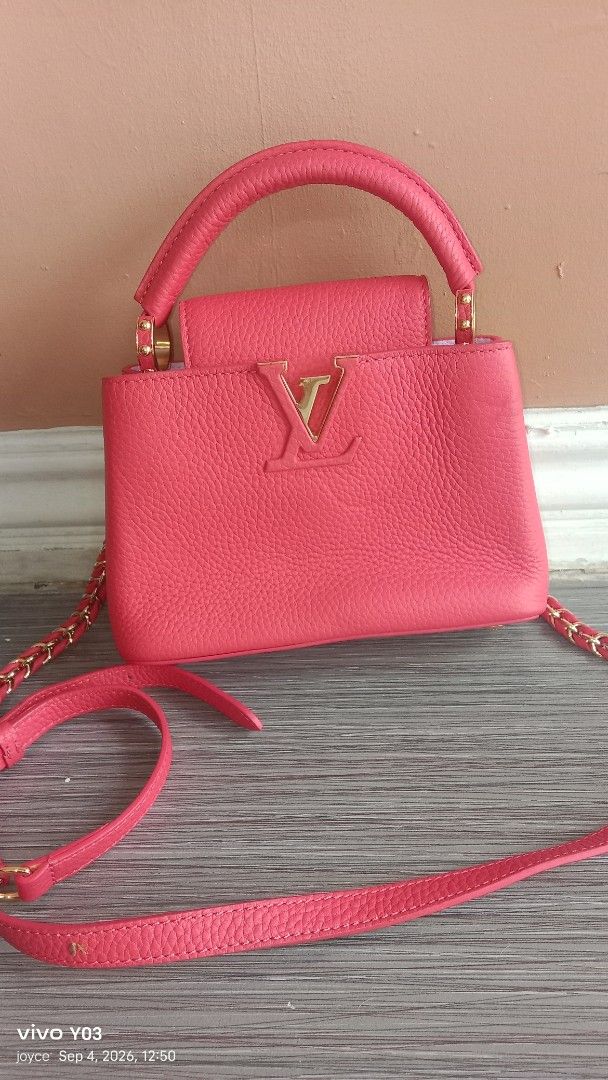 Preloved Louis vuitton Textured Leather Top Handle Bag with Chain Strap (Category: Luxury Bags & Wallets) located in Cabuyao City. Submitted by selections888 (Listing ID 1459535541, Image 3). Description: -preloved from Japan supplier -Cute textured leather bag - Features a top handle and a long chain strap - Elegant gold hardware details - Compact, small size – ideal for carrying essentials - Adds a perfect pop of color to any outfit - Please ch