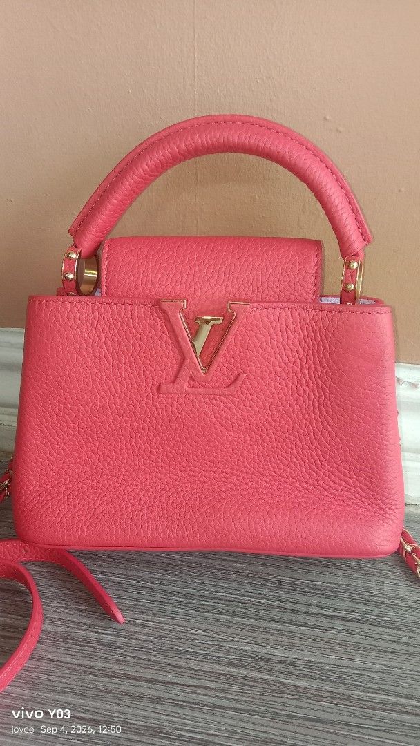 Preloved Louis vuitton Textured Leather Top Handle Bag with Chain Strap (Category: Luxury Bags & Wallets) located in Cabuyao City. Submitted by selections888 (Listing ID 1459535541, Image 2). Description: -preloved from Japan supplier -Cute textured leather bag - Features a top handle and a long chain strap - Elegant gold hardware details - Compact, small size – ideal for carrying essentials - Adds a perfect pop of color to any outfit - Please ch