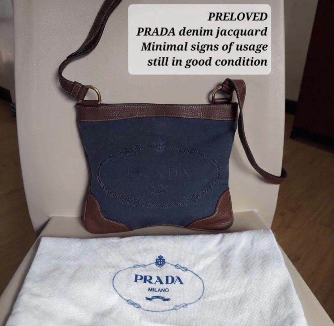PRELOVED PRADA denim jacquard shoulder bag (Category: Luxury Bags & Wallets) located in Andop. Submitted by nikiprelove55563 (Listing ID 1459516514, Image 1). Description: - Preloved Prada denim jacquard bag - Comes with original dust bag - A classic and timeless piece for your collection.
