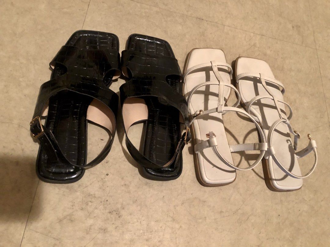 Preloved white and black flat sandals (Category: Sandals) located in Cabuyao City. Submitted by wakahatana (Listing ID 1459649835, Image 1). Description: Take all..