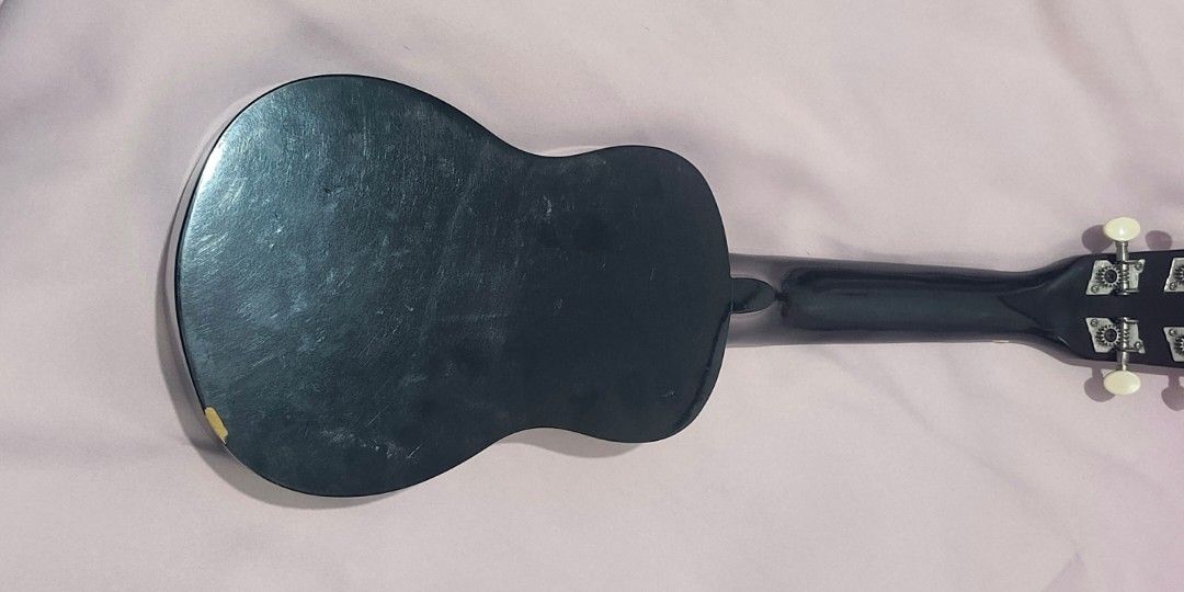 Premiere Black Ukulele with Case (Category: Musical Instruments) located in Pasay City. Submitted by arkyy_67 (Listing ID 1459603527, Image 2). Description: Brand: Premiere Color: Black Type: 4-string ukulele • Fully functional and plays properly • Comes with a case • Good for beginners, students, and casual playing • Has minor dents and small cosmetic damages from use • No major functional issues • Selling as-is, as shown in the photos Price is 