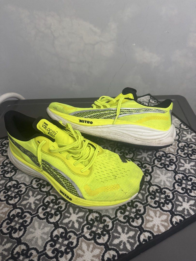 Puma Velocity Nitro (Category: Sneakers) located in Manila. Submitted by certifiedloverbai (Listing ID 1459680327, Image 2). Description: - Puma Velocity Nitro running shoes - Vibrant neon yellow color - Ideal for running and training sessions - Minor scuffs on soles from normal use - Plenty of wear remaining - Feel free to message with any questions.