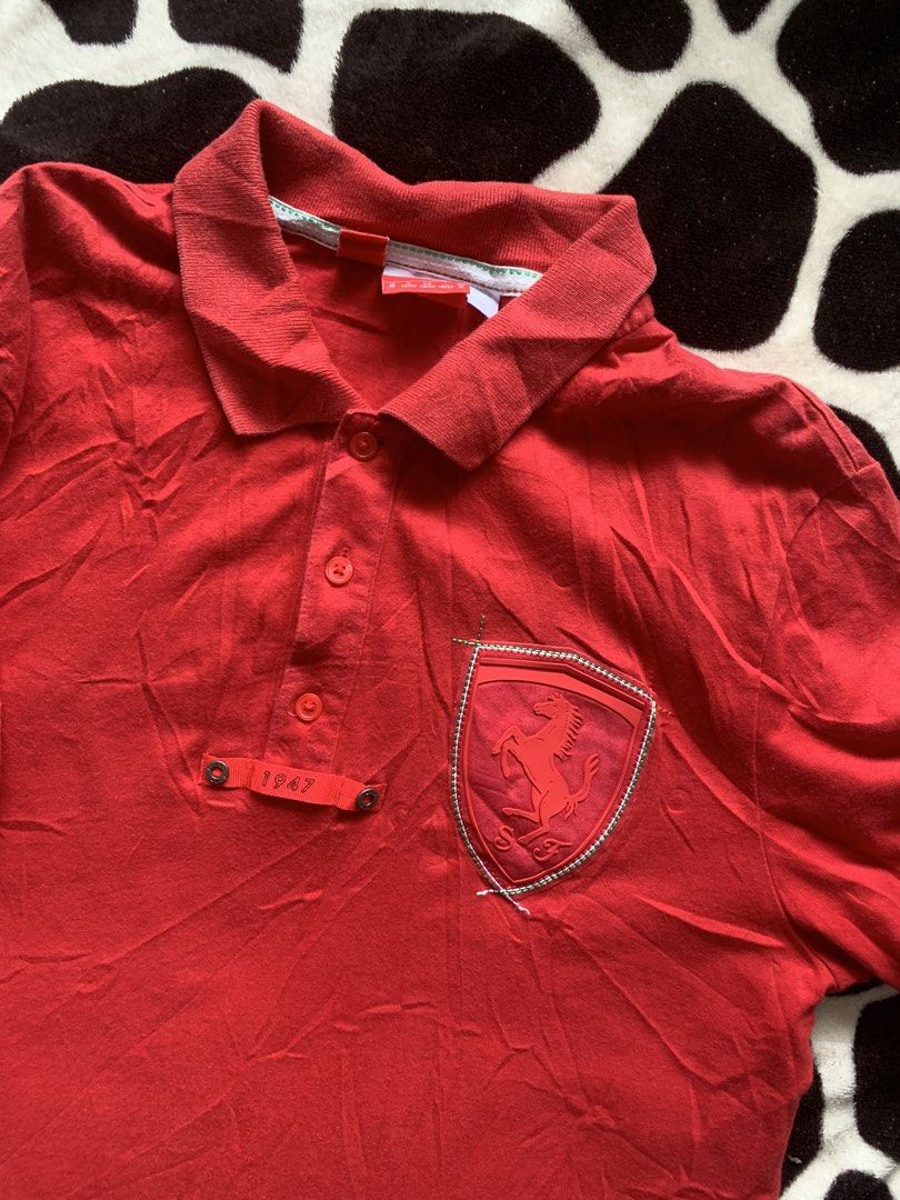 Puma x Ferrari Polo shirt (Category: Tshirts & Polo Shirts ) located in Kabacan. Submitted by nevr_outofstyle (Listing ID 1459520186, Image 2). Description: Puma x Ferrari Polo shirt • Details W- 20” L- 27” Good Condition issue: slight fade in neck area (see pic) buyer will shoulder the delivery fee MOP: Gcash 🚚 J&T.