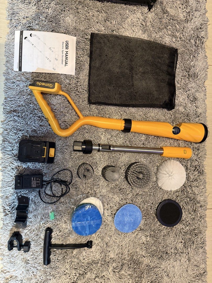 Qimedo Electric Scrubber with Extension Pole & Accessories (Category: Medical Supplies & Tools) located in Pasig City. Submitted by 1009mfcf (Listing ID 1459571776, Image 1). Description: - Yellow Qimedo Electric Scrubber - Includes Extension Pole - Battery: 2.0Ah, 18-21V - Charger: Model LD-2110 - Multiple Brush Heads and Pads included - Ideal for Bathrooms, Kitchens, and more - User Manual included - All parts shown in photos Rfs- bought a smal