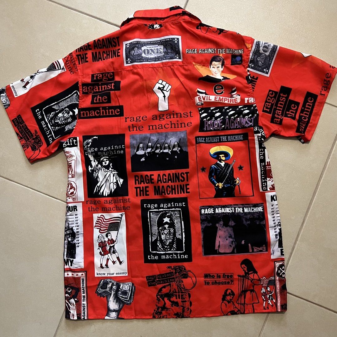 Rage Against The Machine Shirt (Category: Tshirts & Polo Shirts ) located in Taguig. Submitted by groovez_jp (Listing ID 1459577902, Image 2). Description: Rage Against the Machine Red Shirt * Size: XL Shoulder：48 cm Chest：112 cm Length：78 cm （Measurements were taken by hand with the garment laid flat. There may be slight variations.） * Material: The care label states Cotton, but it has a slightly smooth/silky feel to it. * Note: Purchased the wr