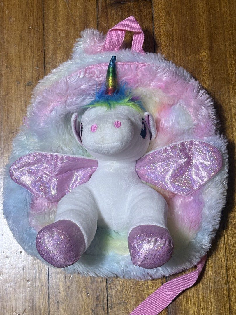 Rainbow unicorn backpack (Category: Babies & Kids Fashion) located in Binan City. Submitted by de.clutterbyM (Listing ID 1459618550, Image 1). Description: Used once! Rainbow unicorn backpack..