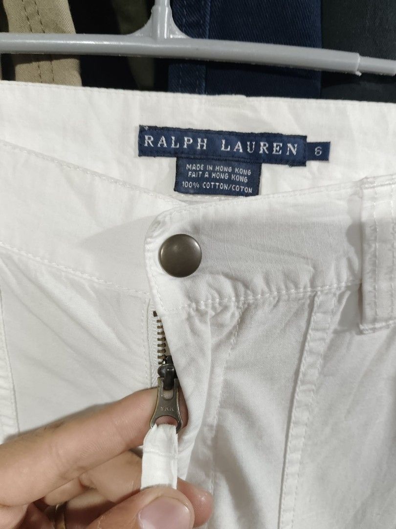 Ralph Lauren White Cargo Pants Size 6 (Category: Other Bottoms) located in Mawab. Submitted by kingacecruda (Listing ID 1459637235, Image 3). Description: - Brand: Ralph Lauren - Color: White - Material: 100% Cotton - Origin: Made in Hong Kong - Features: Multiple zippered pockets on legs - Style: Great for everyday wear or a casual look, easy to style with different tops..