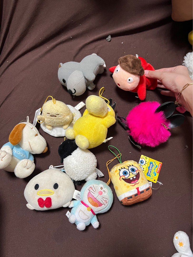 Random Charms Toys (Category: Plushies & Soft Toys) located in Manila. Submitted by erickalago (Listing ID 1459534565, Image 2). Description: Spongebob- 120 Sheep- 199 Ponyo- SOLD ❌ Doraemon- 199 Yellow sitting in white- 199 Yellow duck (not sure if duck huhu) -199 Pink- 100 Gray- 100 White with red bow-120 snoopy-199 .