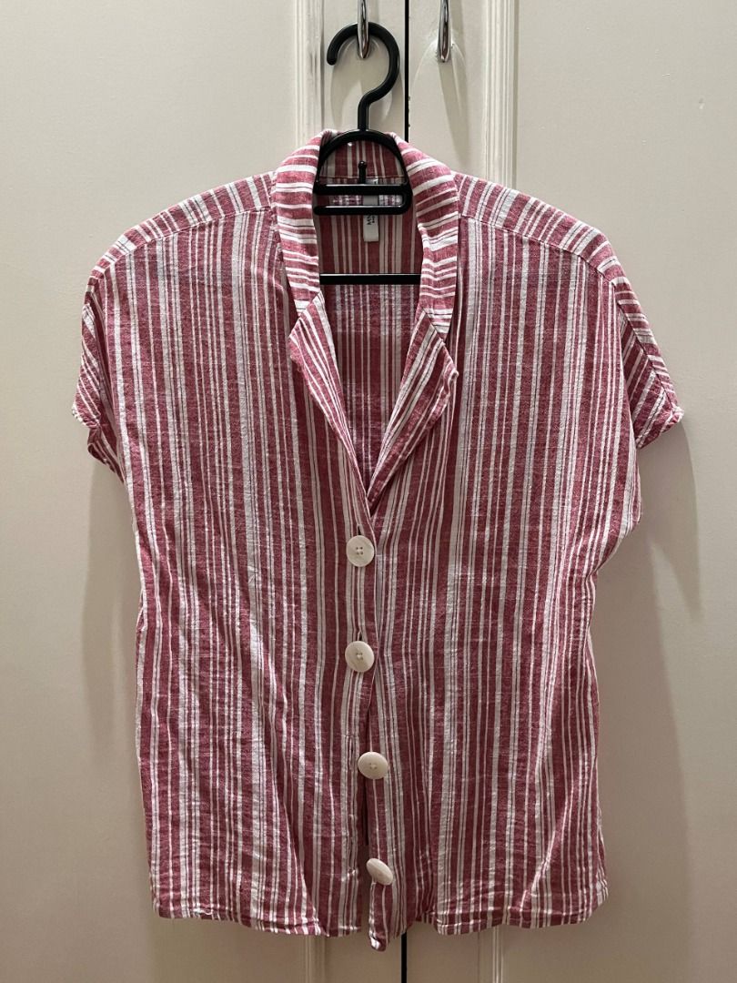 Red and White Striped Button-Up Shirt (Category: Shirts) located in Marikina City. Submitted by piaenrqz (Listing ID 1459664789, Image 2). Description: - Classic red and white vertical stripes. - Short sleeves. - Button-up front with collar. - Relaxed fit for comfort. - Ideal for casual outfits or layering. - PAYO through Gcash or Maya. - Strictly delivery only..