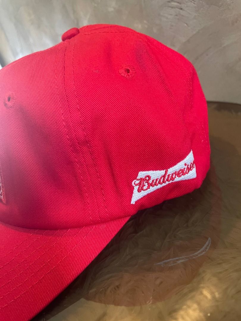 Red Authentic Budweiser Baseball Cap (Category: Caps & Hats) located in Cavite. Submitted by zrojan (Listing ID 1459529184, Image 3). Description: Classic red Authentic Budweiser cap with adjustable strap. Features iconic logo and 'The world is yours to take' text. Perfect for casual or streetwear style..