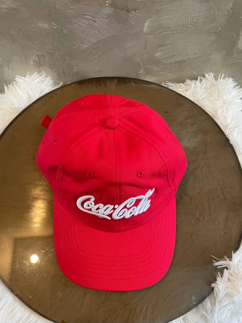 Red Coca-Cola Embroidered Baseball Cap Authentic (Category: Caps & Hats) located in Cavite. Submitted by zrojan (Listing ID 1459529850, Image 3). Description: Classic red Coca-Cola cap. Features the iconic white embroidered logo on the front. Simple and stylish baseball cap design. Adjustable strap at the back for a comfortable fit. Great for casual wear or as a collector's item. Show your love for Coke with this cool accessory..