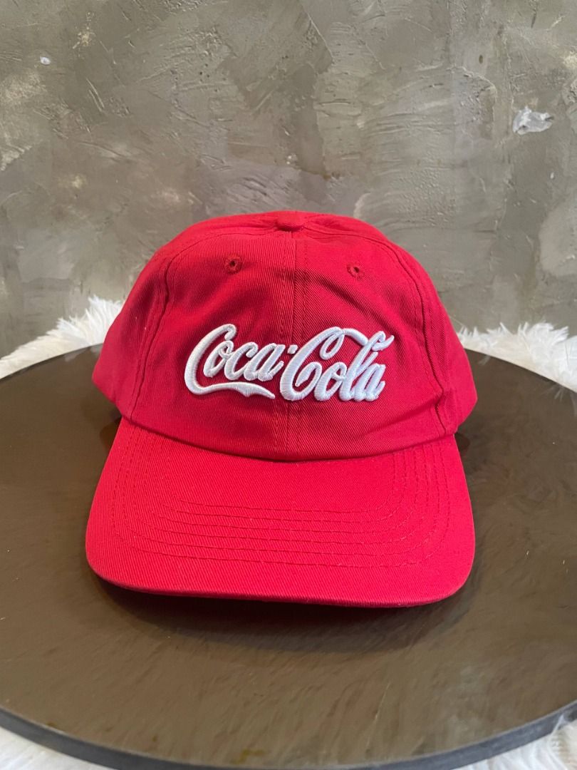 Red Coca-Cola Embroidered Baseball Cap Authentic (Category: Caps & Hats) located in Cavite. Submitted by zrojan (Listing ID 1459529850, Image 2). Description: Classic red Coca-Cola cap. Features the iconic white embroidered logo on the front. Simple and stylish baseball cap design. Adjustable strap at the back for a comfortable fit. Great for casual wear or as a collector's item. Show your love for Coke with this cool accessory..