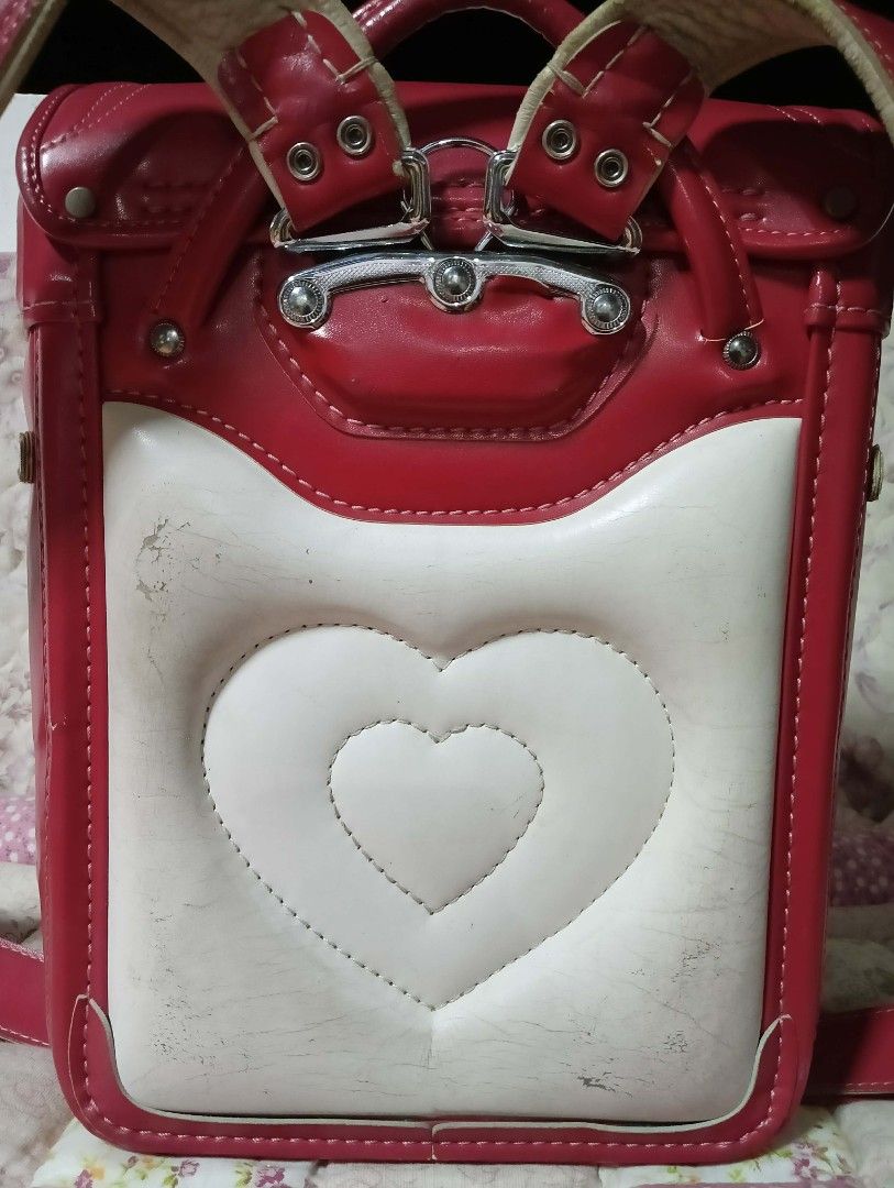 Red Randoseru Backpack (Category: Backpacks) located in Davao. Submitted by fawnnichu (Listing ID 1459687824, Image 3). Description: please see all photos for the actual condition..