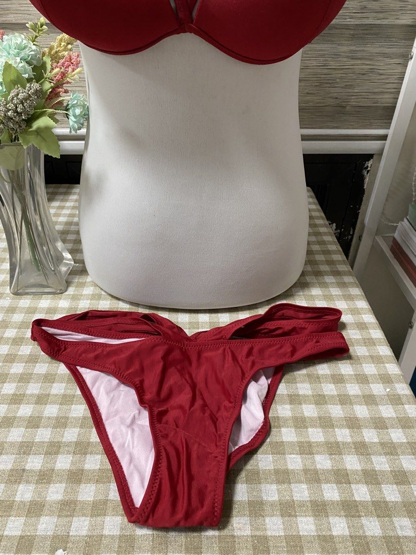 Red Strappy Bikini Set Size L (Category: Bikinis & Swimsuits) located in Cavite. Submitted by yc.shoppemnl (Listing ID 1459514854, Image 2). Description: - Vibrant red bikini set - Features a stylish strappy top design - Classic cut bottoms - Crafted from a blend of 82% polyester and 18% spandex - Adjustable straps and secure back clasp on the top for a perfect fit - Ideal for your next beach or pool adventure.