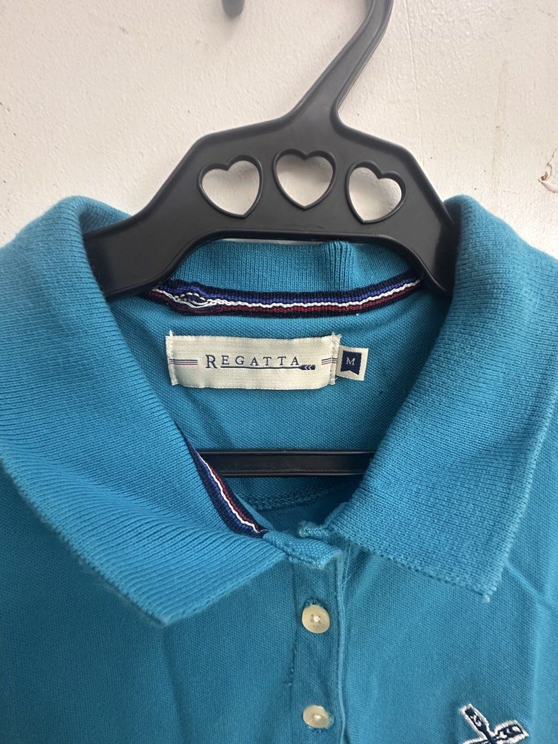 Regatta Blue Polo Shirt Size M (Category: Tshirts & Polo Shirts ) located in Antipolo. Submitted by llsisterscloset (Listing ID 1459511327, Image 2). Description: - Blue Regatta polo shirt - Size Medium (M) - Short sleeves with a collar - Embroidered Regatta logo on the chest - Button closure at the neck - Ideal for casual outings and everyday wear.