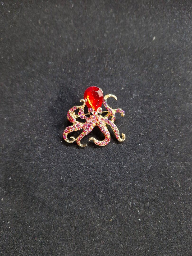 Retro Octupus Brooch 2 (Category: Brooches) located in Taguig. Submitted by mommaschoice (Listing ID 1459581431, Image 1). Description: Brand new Beautifully crafted brooch design Adorned w/ mix colored rhinestones Ships nationwide.