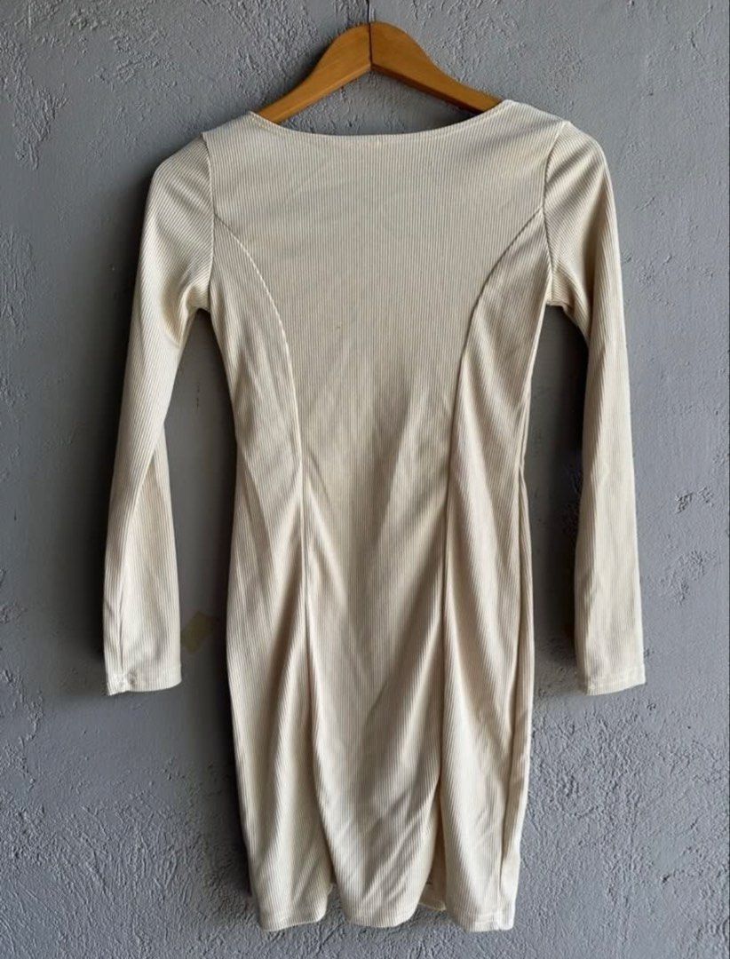 Ribbed Square Neck Long Sleeve Mini Dress (Category: Dresses) located in Binan City. Submitted by forgetmenot_ph (Listing ID 1459508393, Image 3). Description: - First photo is style inspo only, swipe for actual photos - Cream ribbed mini dress - Square neckline - Long sleeves - Bodycon fit - Side slit - Super flattering - Versatile for night out or casual day.