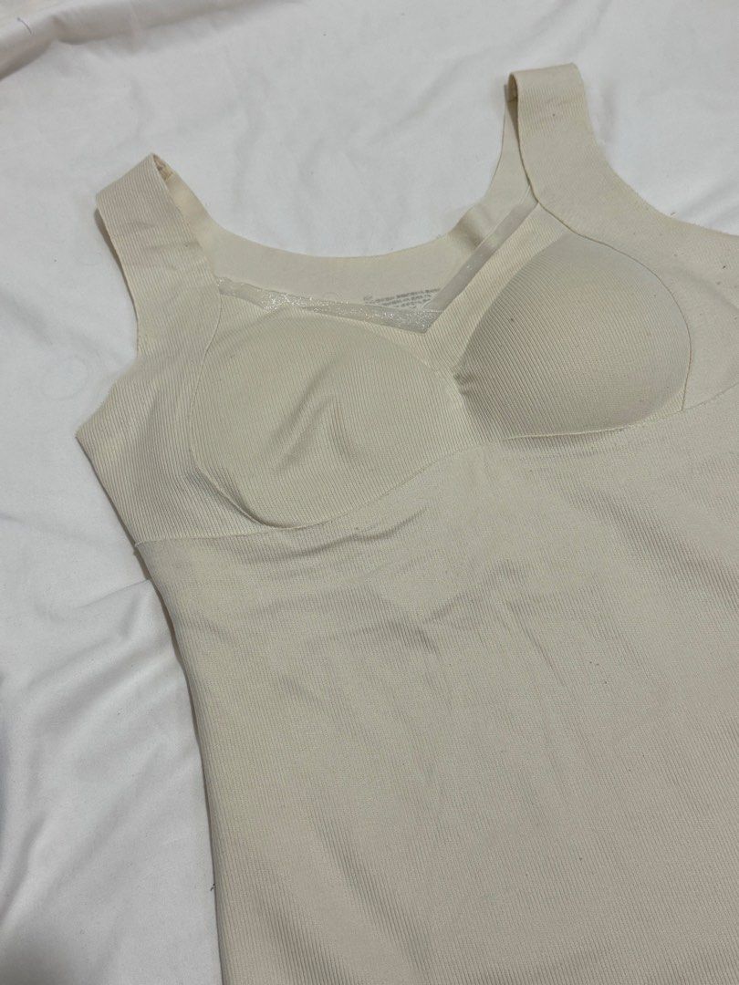 Ribbed Tank Top with Built-in Bra - Cream (Category: Sleeveless) located in Manila. Submitted by halsea (Listing ID 1459643276, Image 2). Description: - Cream ribbed tank top - Built-in bra for support - Comfortable and stretchy material - Perfect for layering or wearing solo - Simple design, easy to match - Ideal for casual outfits -m-l.