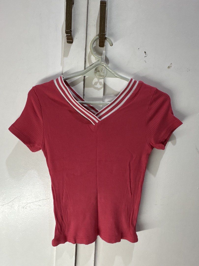 Ribbed V-Neck Cropped Top with Striped Collar (Category: Blouses) located in Malabon City. Submitted by julia4a_ (Listing ID 1459603170, Image 2). Description: - Cute ribbed cropped top - V-neck style with white and red collar stripes - Short sleeves - Stretchy material - Versatile: pairs well with high-waisted jeans or skirts - Easy to style for casual or dressed-up looks.